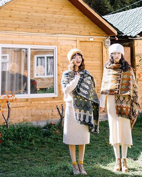 Poncho au tricot blanc femme